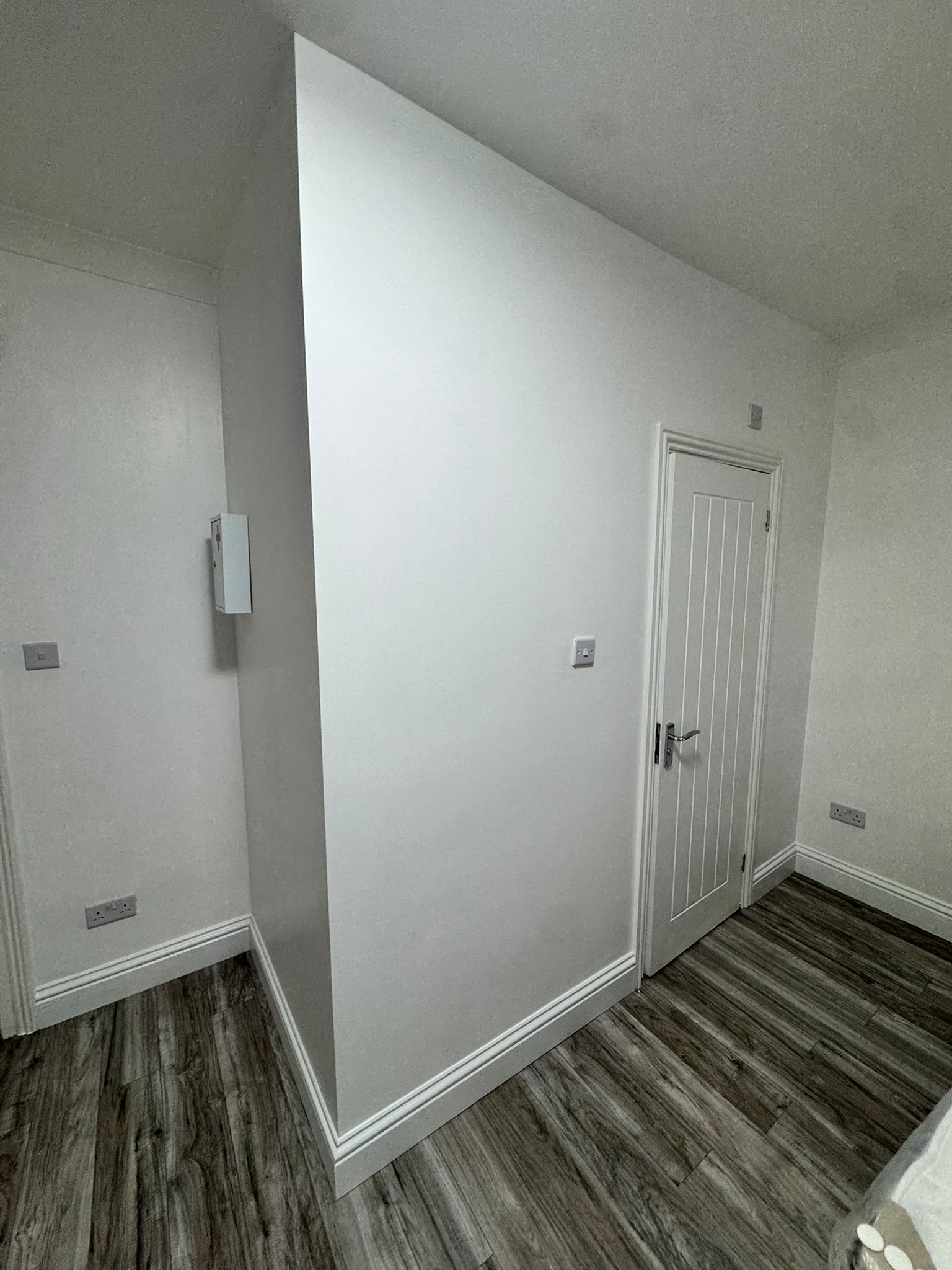 Walk-in wardrobe with bespoke joinery