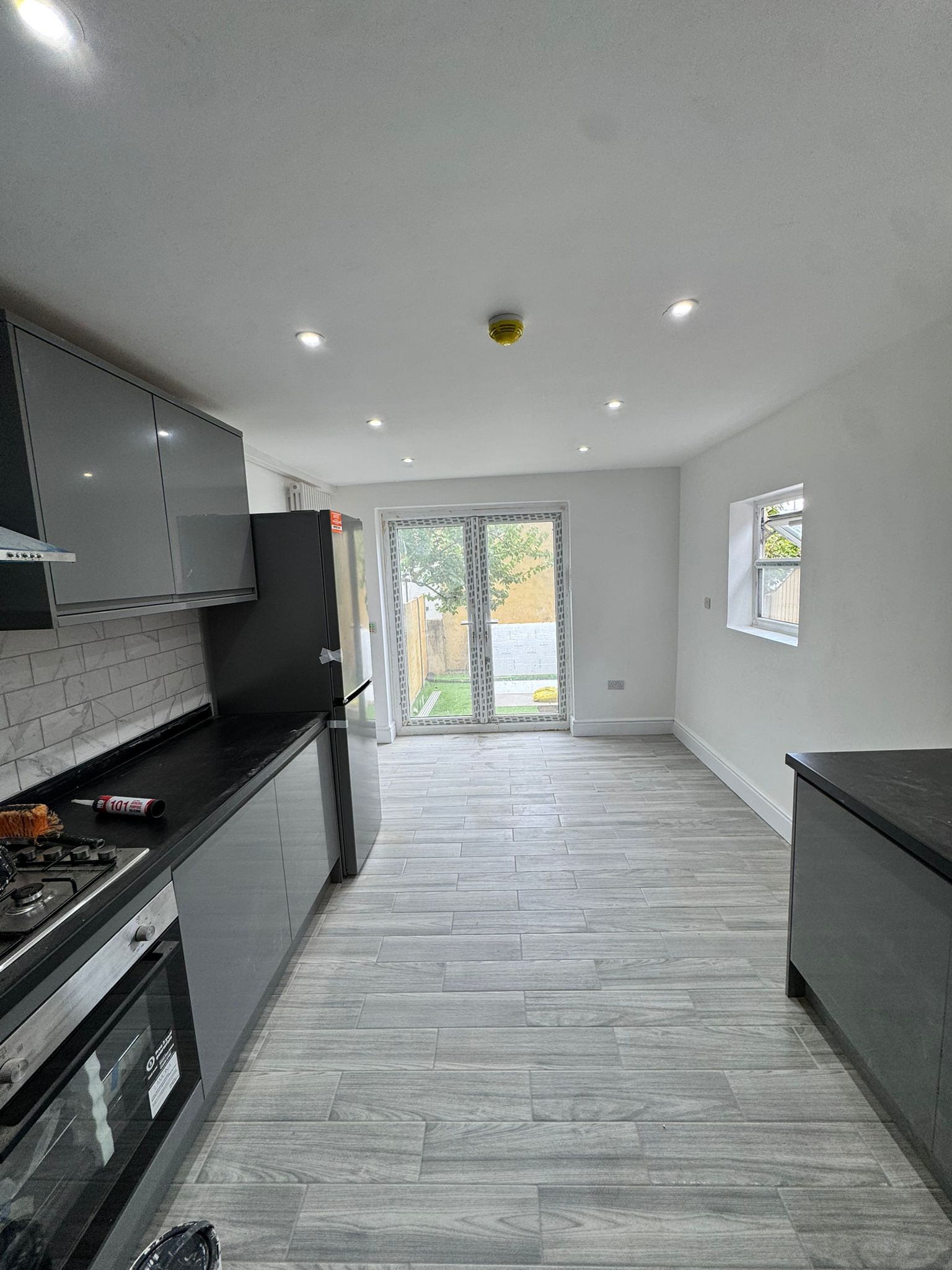 Open-plan kitchen diner after