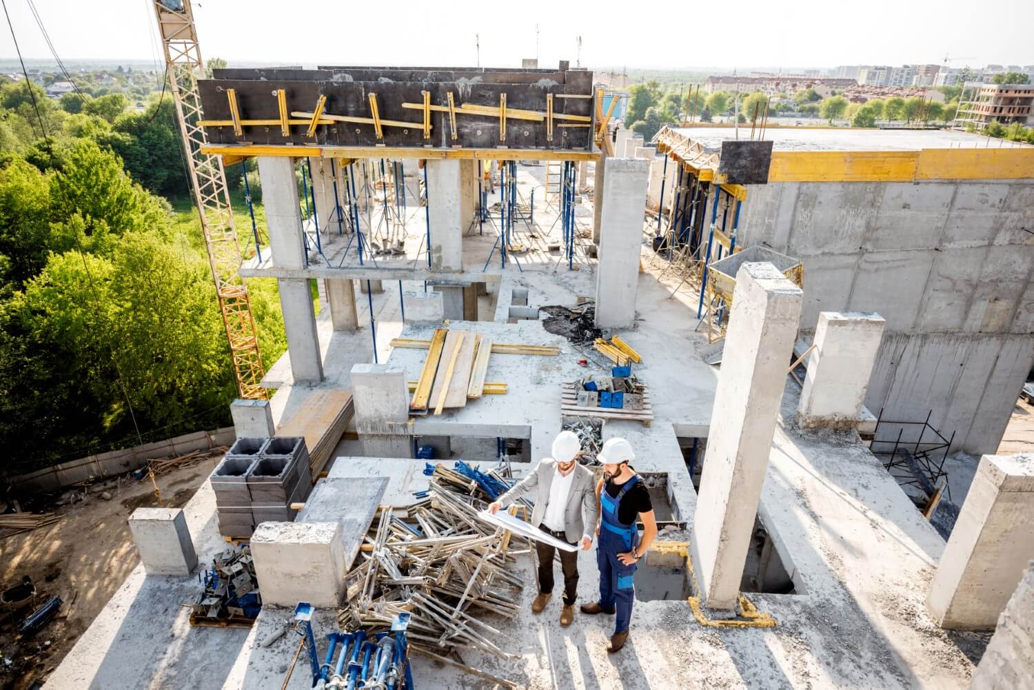 Capital Build Construction team reviewing plans on site